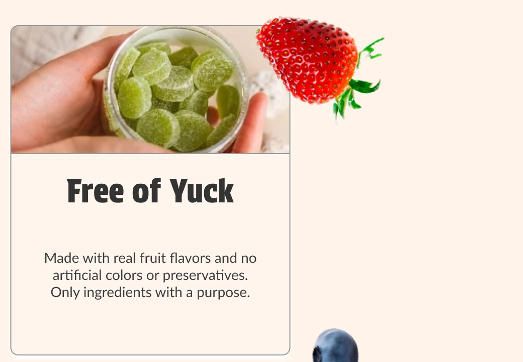 Detail of Why we’re different: a strawberry crosses the top edge of the Free of Yuck card and a blueberry slips past its lower edge.